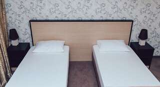 Гостиница Ласточка Южный Стандартный двухместный номер с 2 отдельными кроватями-4